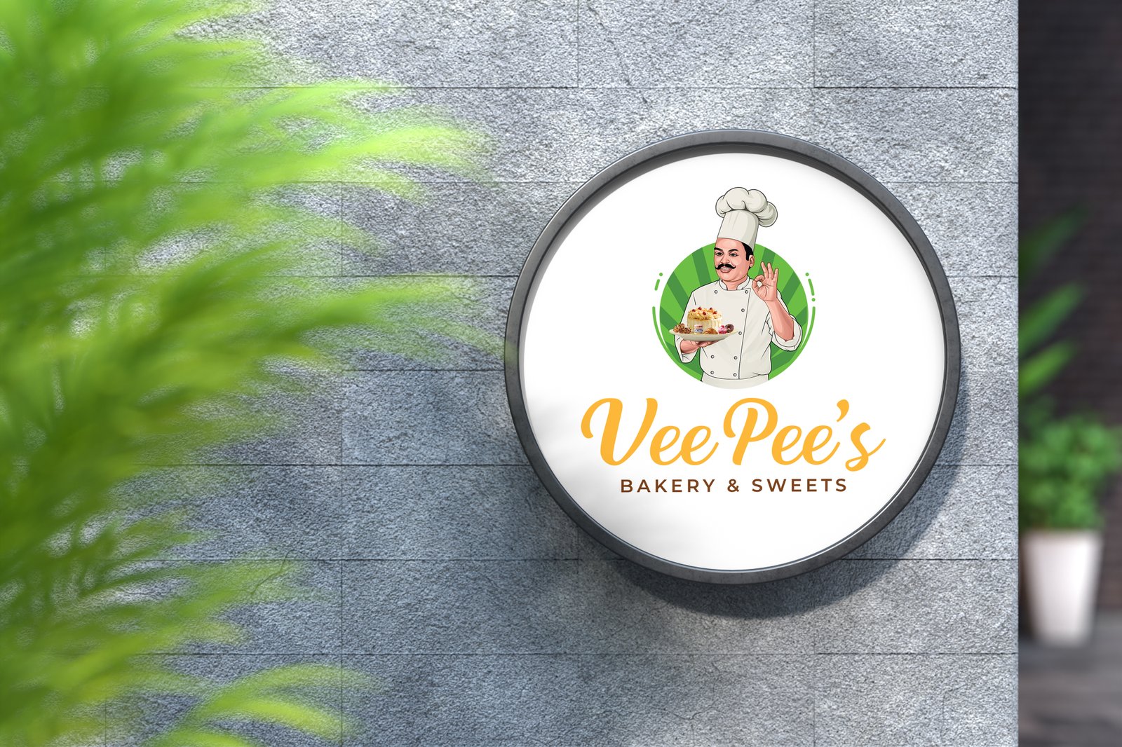 Round outdoor signage featuring bakery logo design with chef illustration and brand name.